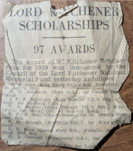 A torn newspaper clipping announcing the 1939 Lord Kitchener Scholarships with a list of recipients and their schools.