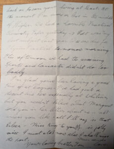 Handwritten letter on folded paper with cursive ink text discussing chemistry exams, sports, and family news.